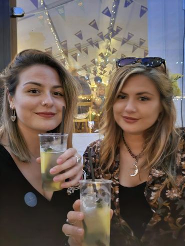 2 customers enjoying their cocktails!