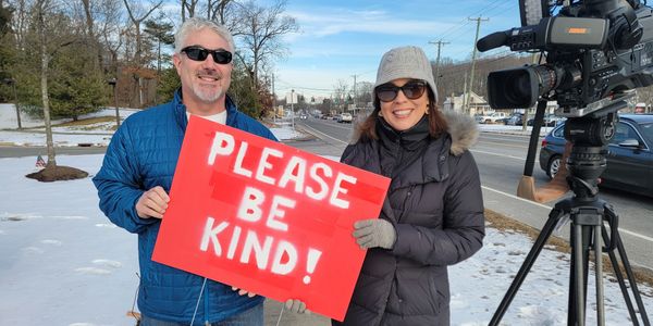 WTNH News 8 Sarah Cody and Ken Engelman; Please Be Kind signs; Community Volunteers United