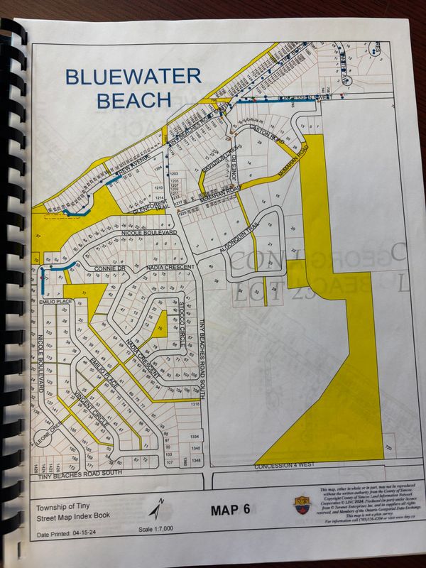 Map of Bluewater Beach area with highlighted zones and street names.