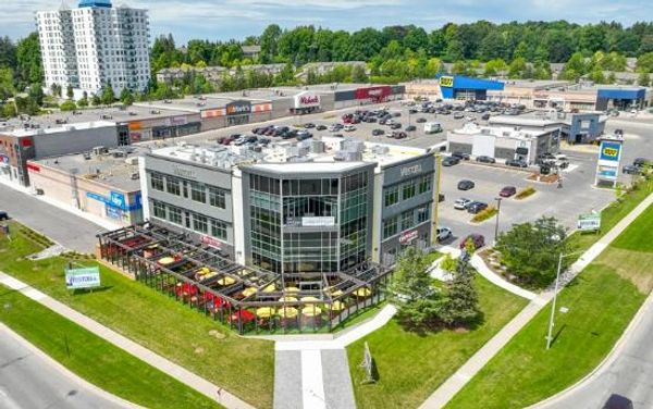 Aerial view of the Hyland Office Building in Ontario, Canada, with surrounding retail.