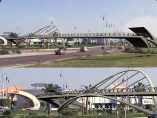 Two views of a modern pedestrian bridge with arched supports over a road and landscape.