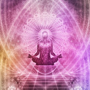 Silhouette meditating amid vibrant cosmic and geometric patterns.