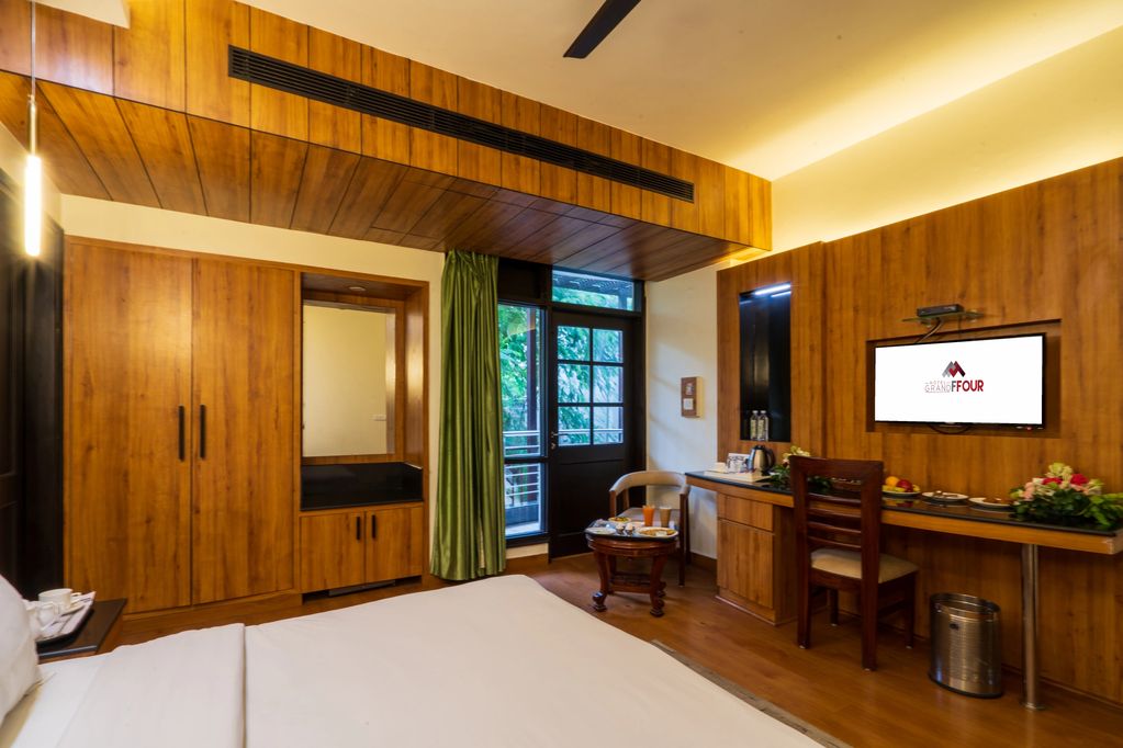 Standard Room at Hotel Grand FFOUR South Delhi – modern interiors, queen bed, and cozy comfort