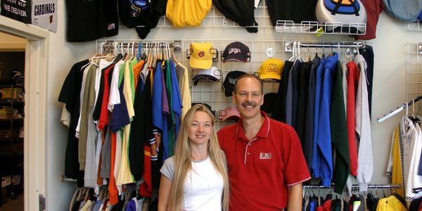 Sales and production workers, in sample show room.