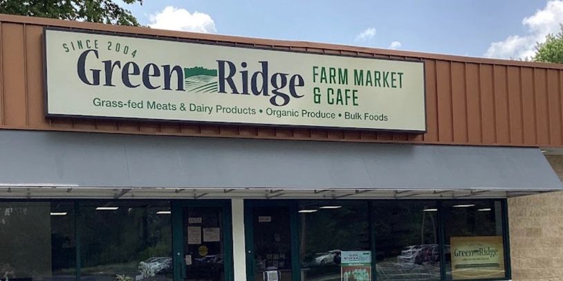 Exterior of Green Ridge Farm Market &amp; Cafe with signage.