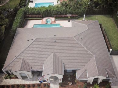 Tile Reroof project in Coral Gables community using Boral Saxony 900 concrete roof tiles.