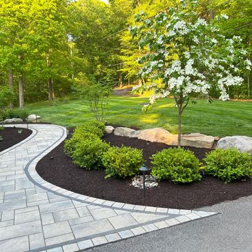 front walkway flowerbed going to driveway