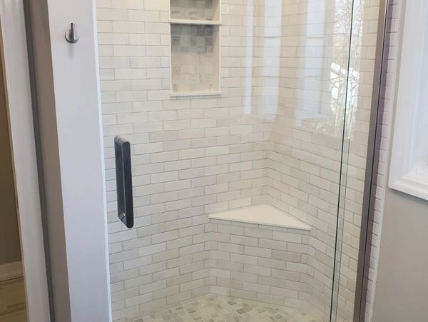 custom bathroom, custom shower bench, large glass swing door