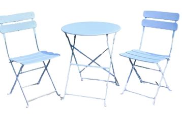 Light blue metal folding bistro set for outdoor Scotland weddings and experiential events.