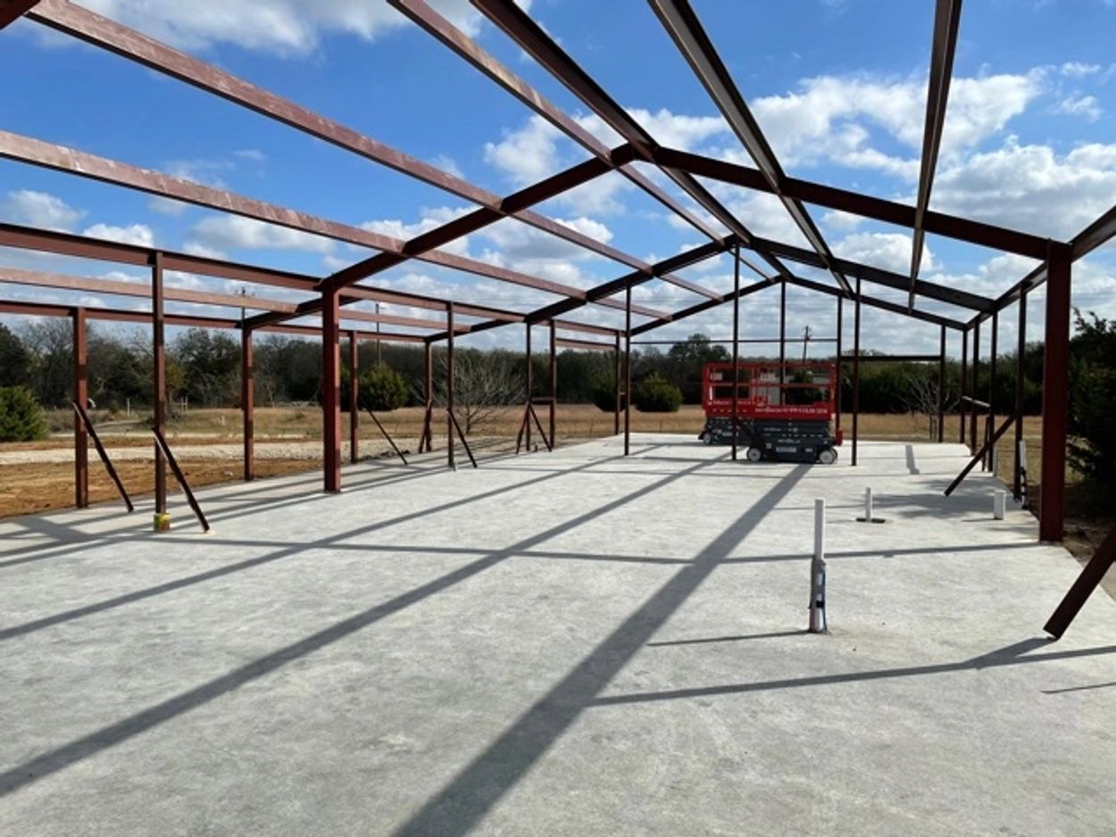 We start with a main frame of solid red iron framing on top of a 4000 psi slab