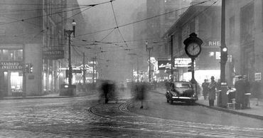 Pittsburgh at noon in the 1940s with air pollution 