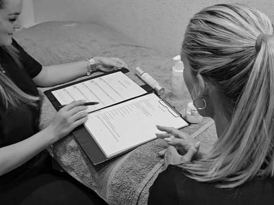 Therapist smiling consulting with a client