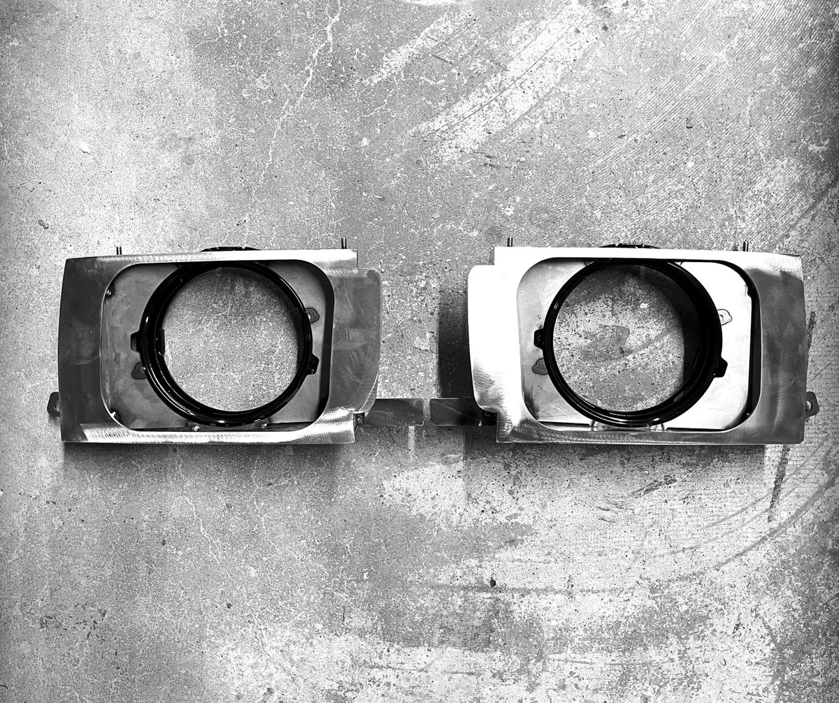 80 series headlight housings pair