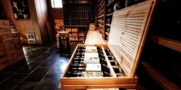 Vintage wine box on a table in a wine cellar