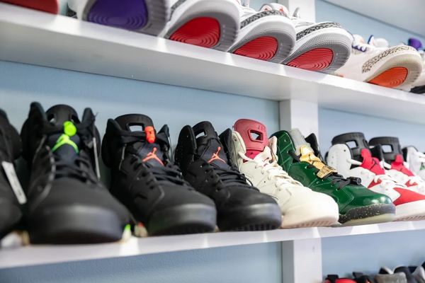 Branded sneakers on a cabinet