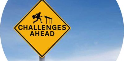 Challenges ahead road sign