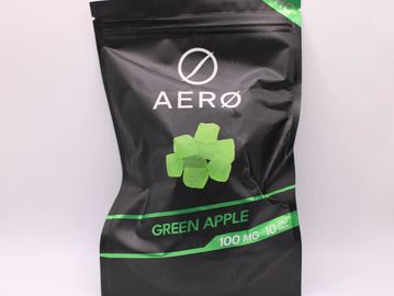 Black package of Aero Green Apple gummies with 100mg THC.