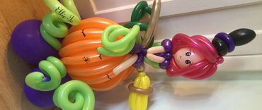 Witch on a pumpkin Balloon ! Look at our loveky witch on a twisted balloon pumpkin on her broom 