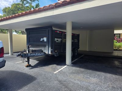 Affordable dumpster rental from a local dumpster rental service showing same-day delivery of a dumpster parked on a job site