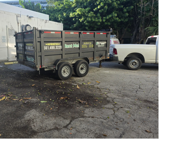 Pickup truck delivering an affordable dumpster rental from a local dumpster service with same-day delivery