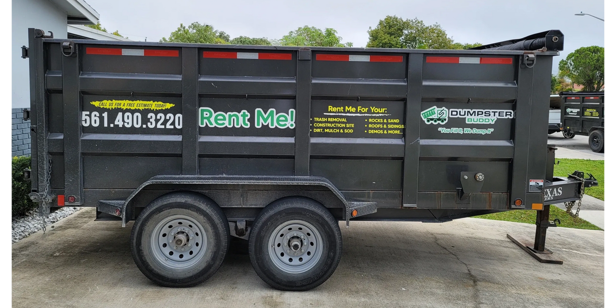 Black 14 yard dumpster with contact info and services listed.