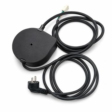 Black electrical cable with a plug and a round black component.