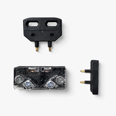 Three black cassette tape adapters with gold connectors on a white background.