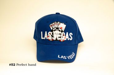 Blue Las Vegas cap with poker hand design.