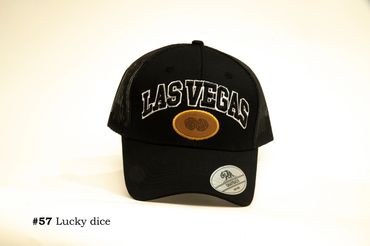 Black Las Vegas snapback cap with lucky dice emblem.