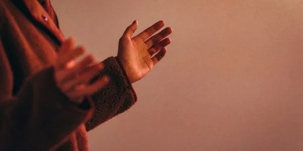 Hands held up in worship to God