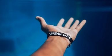 An outstretched hand to serve and spread love illustrates the hearts of those at Agape San Carlos.