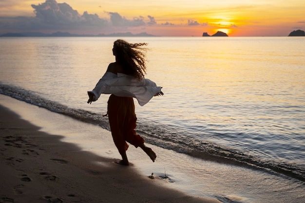 Woman walking in beach