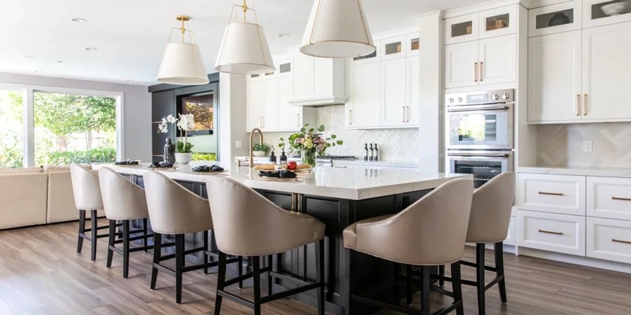 
This image shows a bright and inviting kitchen space with a modern, open-concept design. 