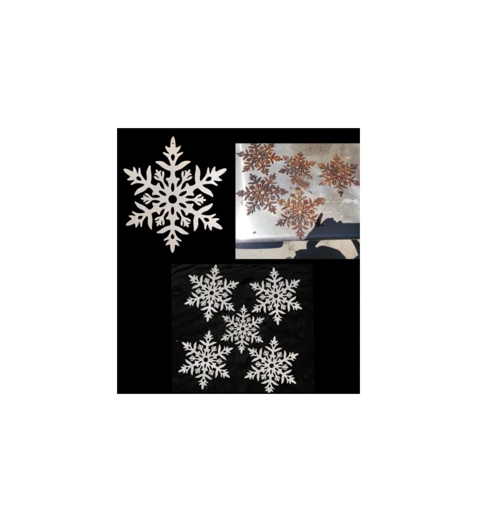 White snowflake cutouts in different stages of painting and display.