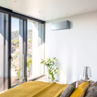 Wall mounted air to air heat pump air conditioner.