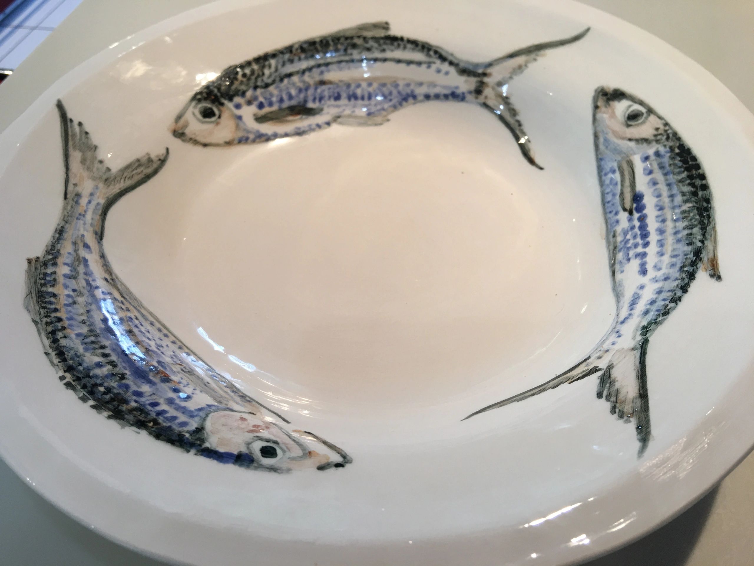 'HAPPY FISH DESIGN' White earthenware handmade, handpainted ceramic bowl.