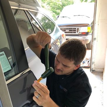 Paintless dent repair technician 