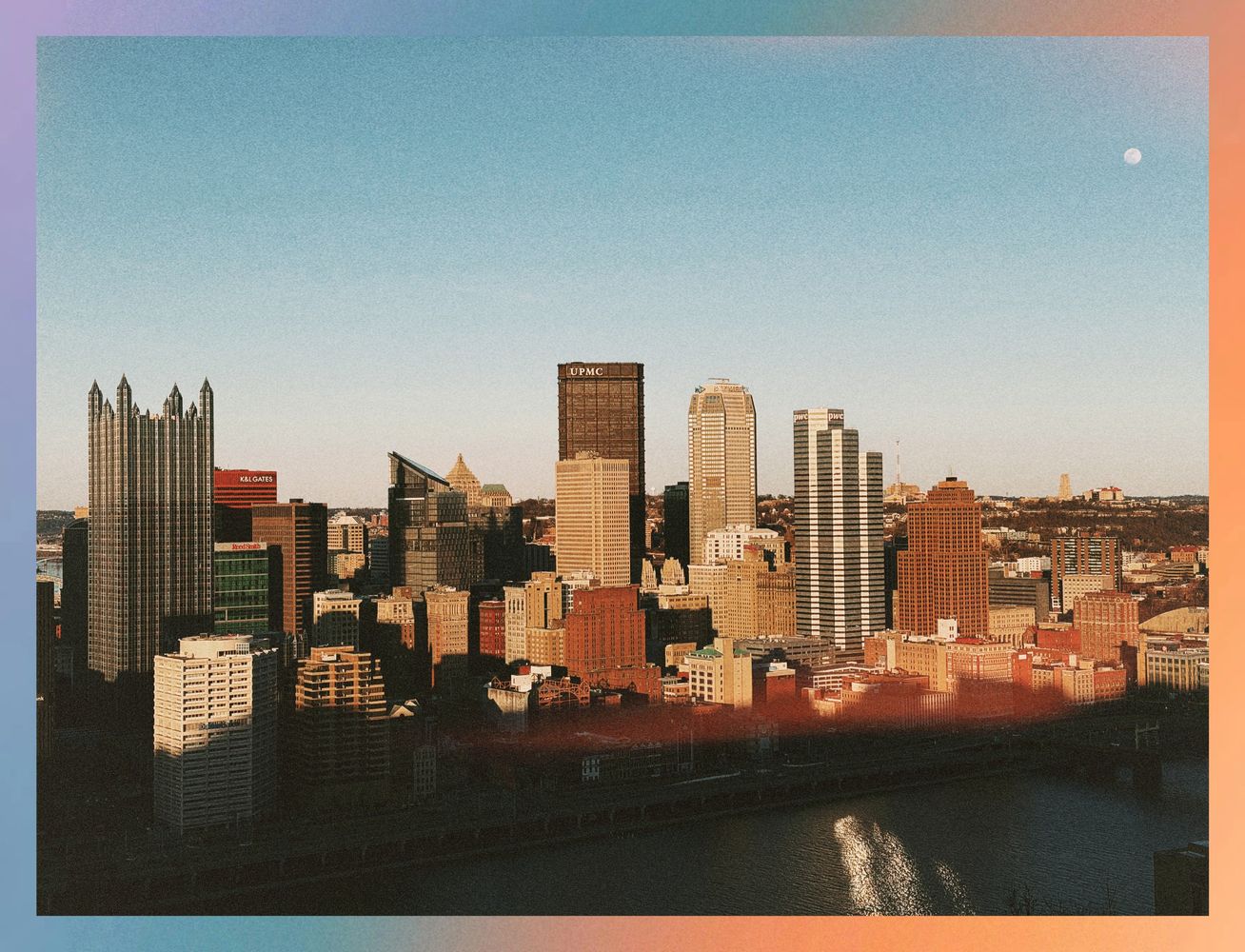 Overlooking Pittsburgh from the Mount Washington Overlook during sunset, with an almost full moon.