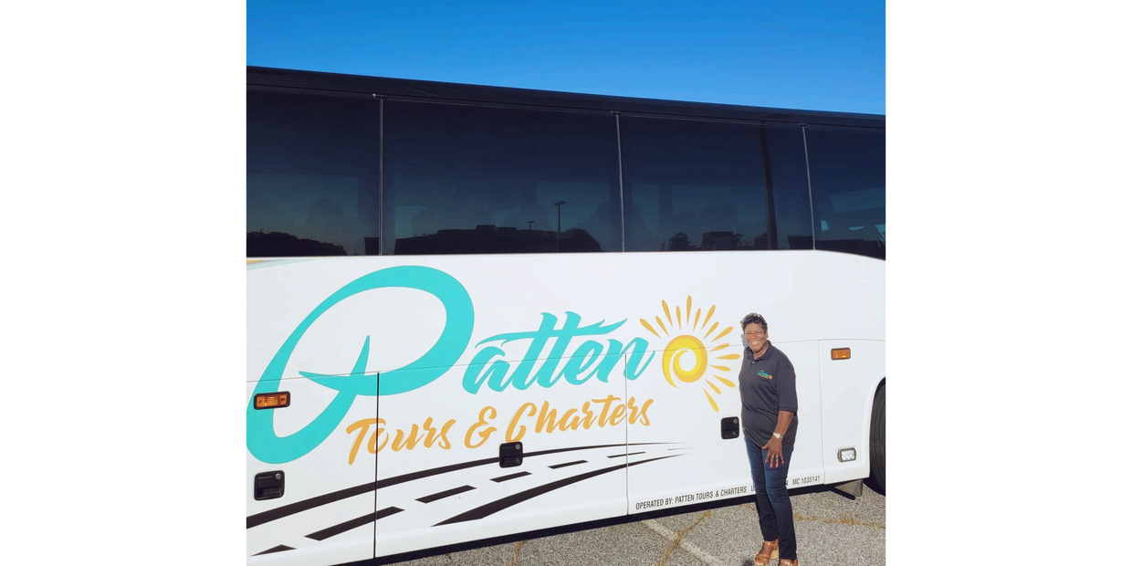 A beautiful logo on the body of the bus 