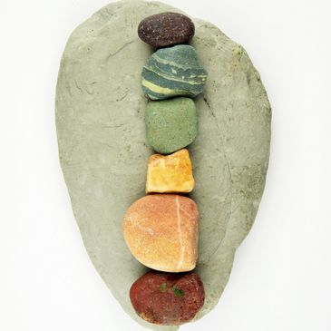 Rainbow rocks on gray rock