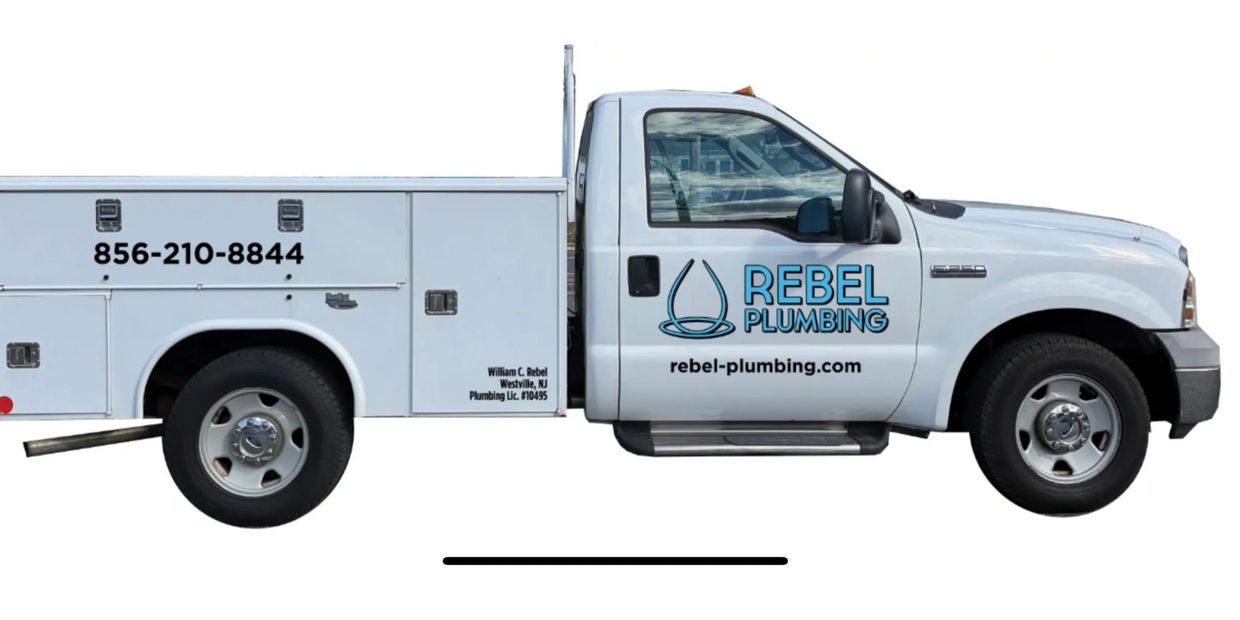 Plumbing technician installing water heater in South Jersey , plumbing including repair and install