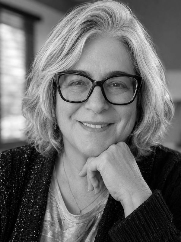 Professional portrait of Traci Clow, founder of Clow Coordination Services and trusted support partner for Delaware real estate agents.
