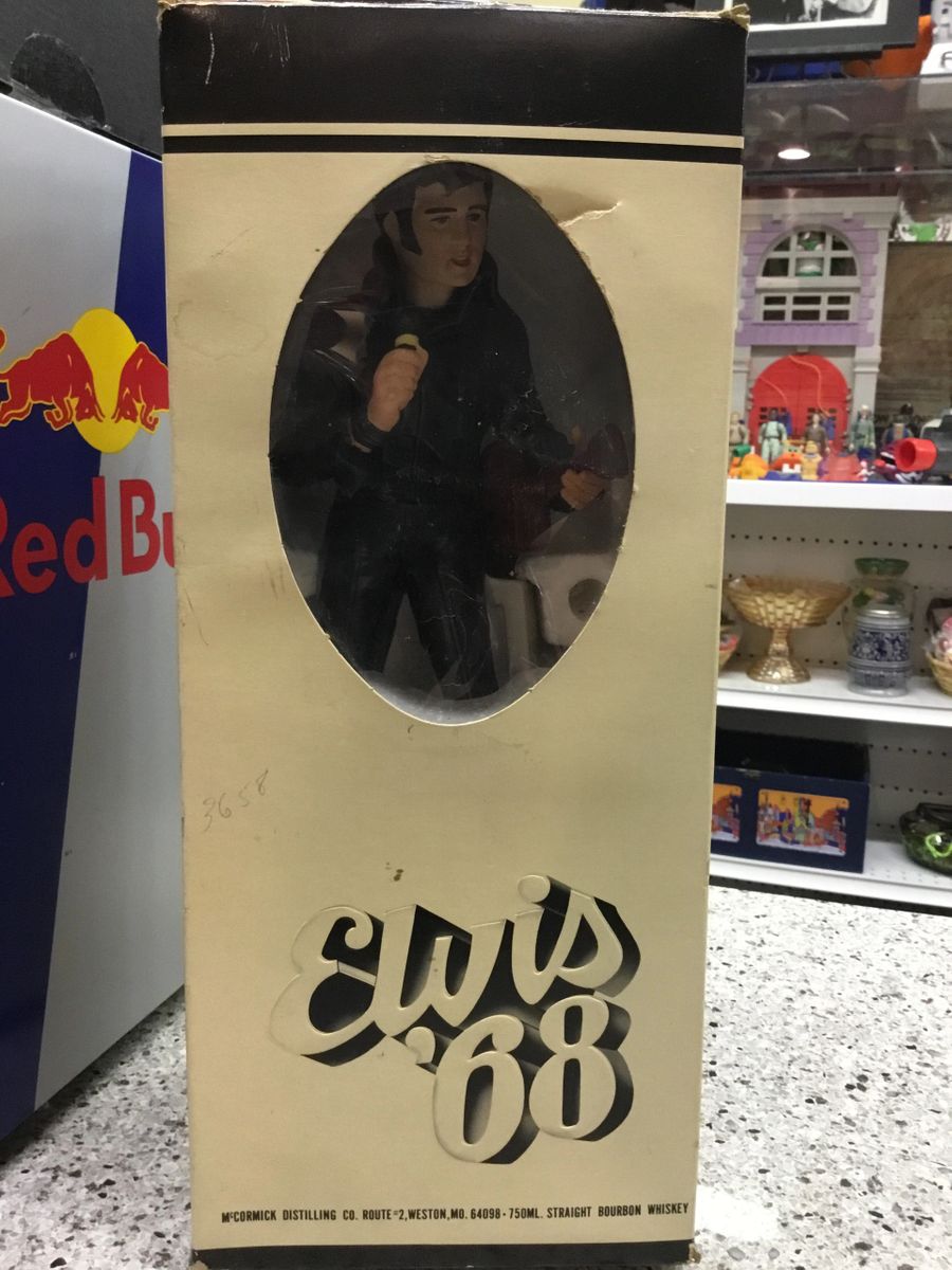 .1968 Elvis Presley decanter music box.