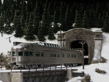 HO scale model of Rio Grande Zephyr entering west portal of Moffat Tunnel