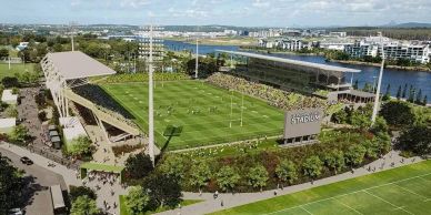 Sunshine Coast Stadium Brisbane 2032  A modern stadium with green rooftop and waterfront surroundings.