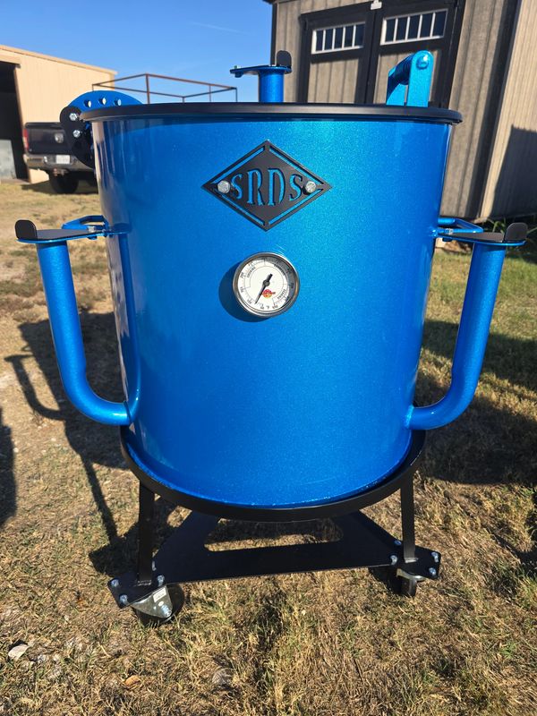 This is our base model. It comes with 3 swivel wheels, grate, diffuser plate, and small fire box.