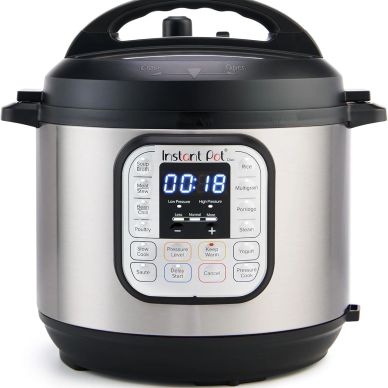 Instant Pot electric pressure cooker with digital display and control panel.