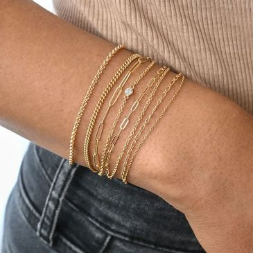Style these sweet permanent bracelets in 14k gold-filled and sterling silver chain options. 