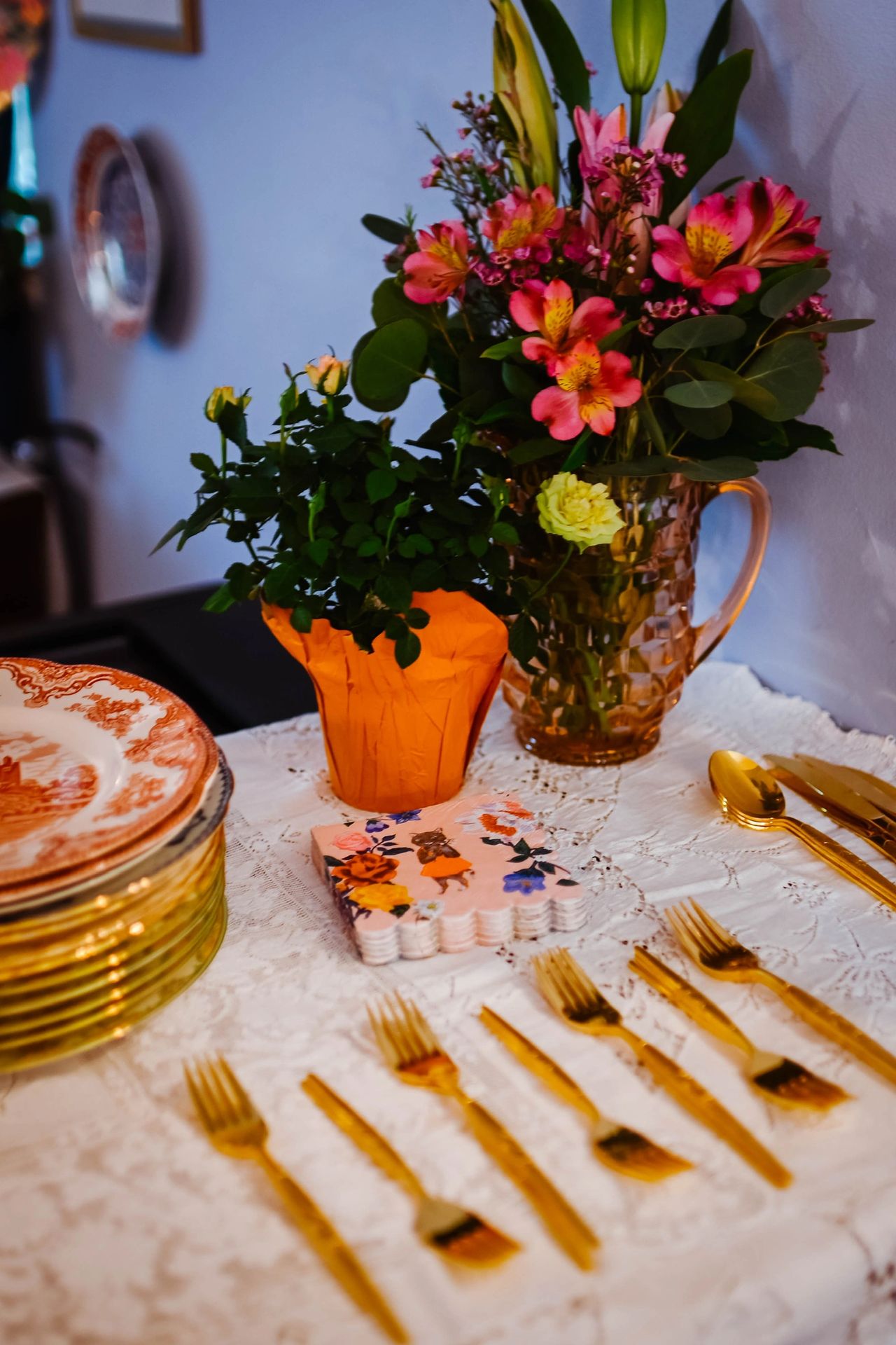 Fresh flowers in vintage pitchers and stacks of vintage china created a charming atmosphere.