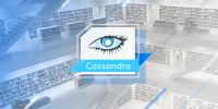 Cassandra logo over a spacious, multi-level library interior.